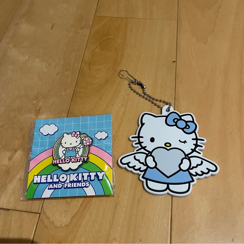 New hello kitty keychain/pin bundle